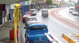 New Zealand woman chases pet dog attached to flag in hot pursuit