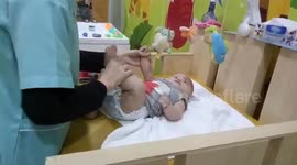 Adorable baby relaxing at spa