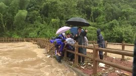 Man rescued after being washed away in flash floods