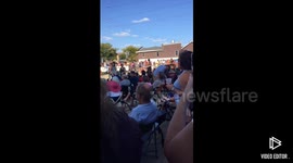 Man and Dog with matching fedoras dancing to blues music