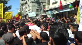 Huge crowds at funeral of Palestinian protester 'killed by Israeli forces'