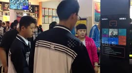 Students swipe faces to pay for meals in high school canteen