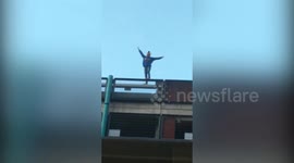 Daredevil woman in UK climbs eight-storey car park with no safety harness