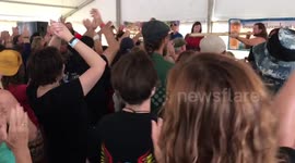 Woman works herself into dancing frenzy at the Highlands Festival in Colorado, USA