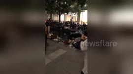 Hundreds sleep in front of Singapore's Apple Store ahead of new iPhone release
