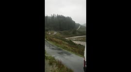 Engineers stuck in the middle of countryside as river overflows