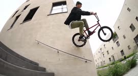 Cool BMX Bike Rider rides down a Wall!