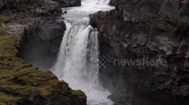 German kayaker Adrian Mattern being the first human attempting to kayak down infamous Markarfljótsgljúfur waterfall in southern Iceland