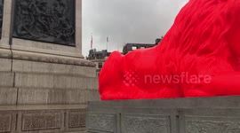 Giant lion sculpture 'roars' poetry in London's Trafalgar Square