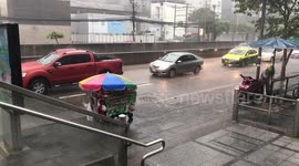 Heavy rain causes flooding and traffic chaos in Bangkok