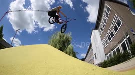 Huge BMX Bike Jump in colorful, urban Location