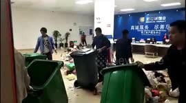 Disgruntled residents dump their rubbish in property management office