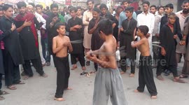 Mourning(Zanjirzani/chain with Knife) on 10th muharram by Shia Muslim Kids