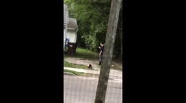 Guy runs from the cops slam the front door hangs out the window talking shit