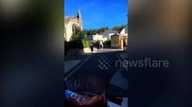 Woman rides horse through town centre - completely NAKED