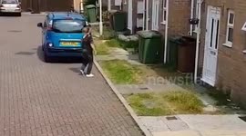 Video shows drug-crazed woman waving knife at neighbours in quiet cul-de-sac