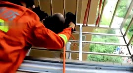 Firefighters rescue toddler hanging out of 9th-floor balcony