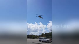 Sandbags airlifted to lake in flooded Carolina city following Hurricane Florence