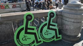 Action of APF (Association des Paralyses de France). Handicapped, disabled people protest against the lack of accessibility in the transport network over the world. Paris, France, Place de la Republique 26 September 2018
