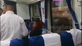 Woman steals other passenger’s seat then splashes filming onlooker