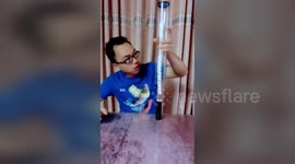 Pinpoint precision as man shakes 22 dice onto the head of a nail