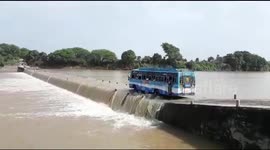 40 passengers endangered as bus rides through flooded bridge in central India