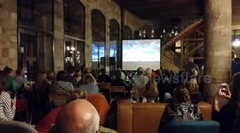 Belgian supporters cheer in their home country for victory against France in the Basketball World Cup