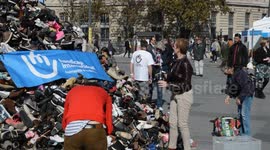 Pyramid of shoes by Handicap International (24th edition); And demo on a fake mined war zone. Place de la République, Paris, France.29 september, 11h.