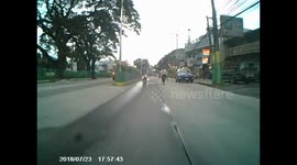 Careless teenager crashes bike into the back of a car
