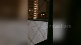 Footage shows lights in apartment windows flickering non-stop as typhoon bears down on Tokyo