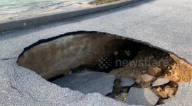 Roads in Okinawa, Japan wrecked by Typhoon Trami