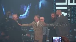 Tyson Fury and Deontay Wilder have to be pulled apart at press conference