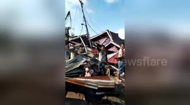 Footage shows entire housing estate flattened by Indonesia quake