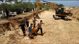 Mass burial begins for victims of Indonesia earthquake and tsunami