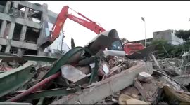 OCT. 2: Rescue teams search for survivors beneath rubble of Palu hotel