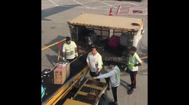 Hong Kong airport handlers caught throwing luggage onto trolley