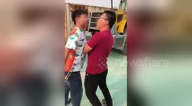 Newsflare Edit - Two Chinese men fight in a very bizarre way