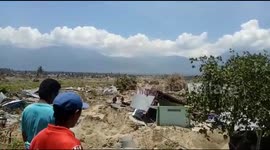 Footage shows ground cracked, structures reduced to rubble after 7.5-magnitude earthquake devastates Indonesian island