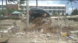 Vehicles, coastal infrastructure destroyed after 7.5 Indonesia earthquake and tsunami