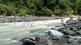 Daring teachers in Philippines float down rapids to reach their school