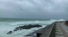 Waves crash on Okinawa beach as typhoon brings strong winds and rains to Japan's south