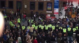 Football fans escorted by police clash ahead of game near London Bridge Station