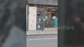 Woman caught smashing her way into shop using melon