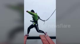 Lucky escape as safety cord slips off harness at high-altitude Chinese theme park