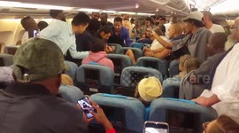 Altercation as French police attempt to kick man off flight