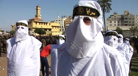 Masked fighters from Gaza Islamic Jihad's military wing 'Saraya Al-Quds' or 'Jerusalem Brigades' participate in military parade in Gaza City