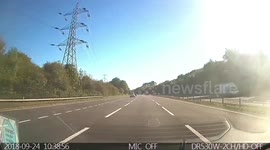 Idiot driver tries to move two lanes. Very nearly causes a crash at 60 miles per hour.