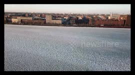 Aerial footage of sea frozen in Amsterdam, Netherlands