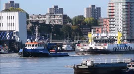 Woolwich Ferry 'John Burns' being towed down the Thames to France to be scrapped
