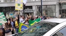 Far-right counter Brazil women group outside. Brazil embassy, London, UK